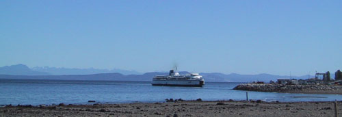 View of BC Ferry arriving at Little River seen from our Comox bed and breakfast